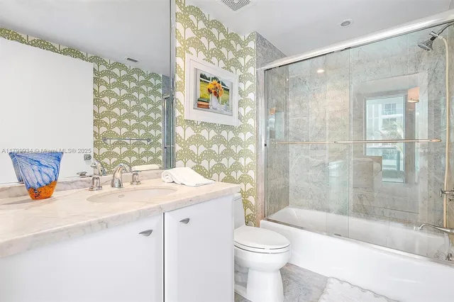 a view of a bedroom with baby bed