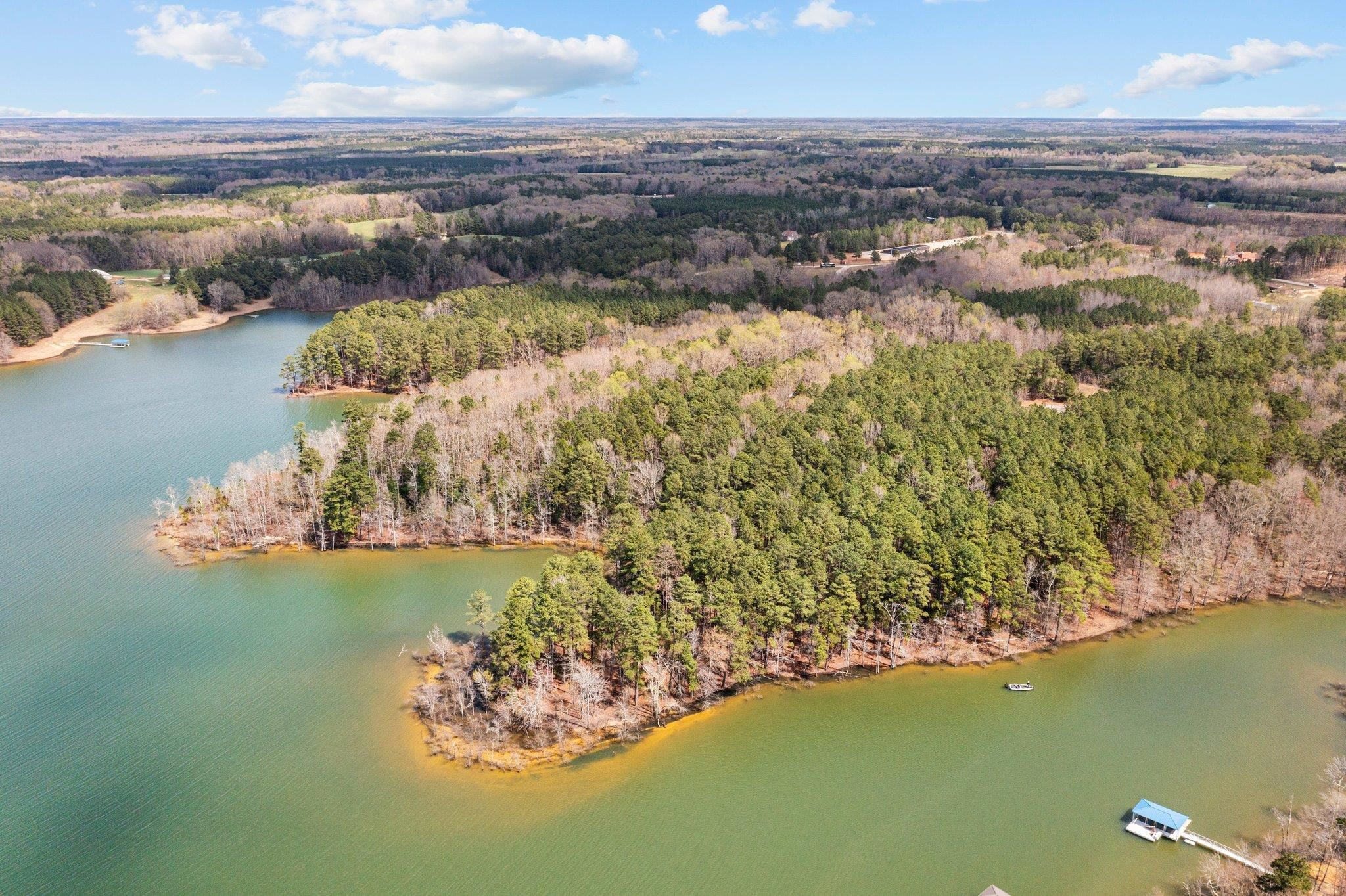 Lot 30 Key Largo Lane Manson, NC 27553 - Photo 13 of 20 a view of a lake with a yard