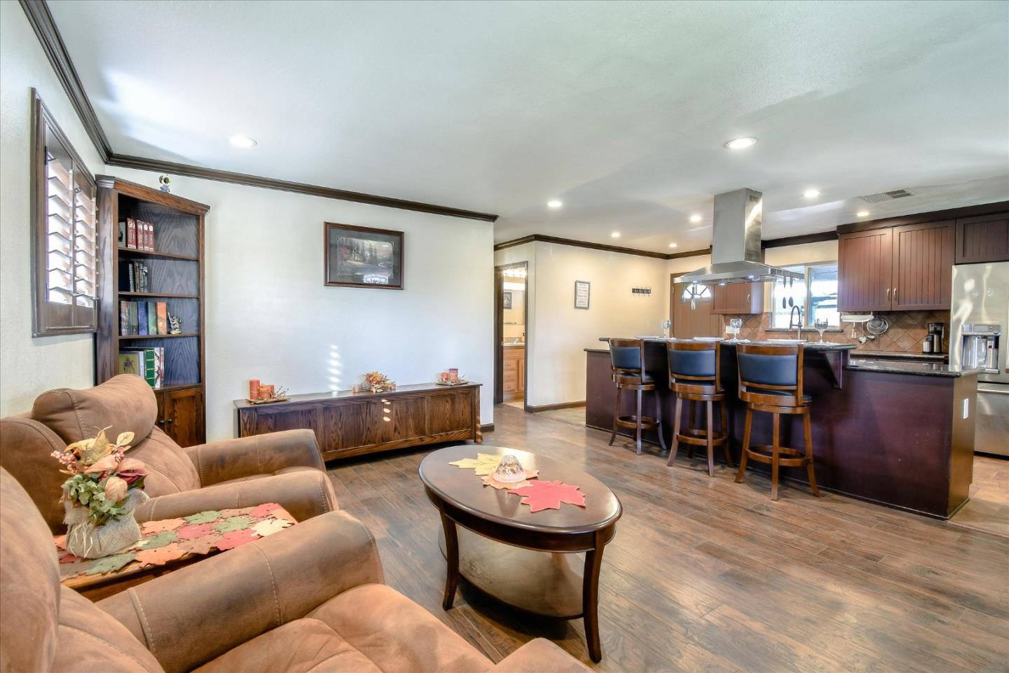 2055 Hogan Drive Santa Clara, CA 95054 - Photo 12 of 37 a living room with furniture and kitchen view