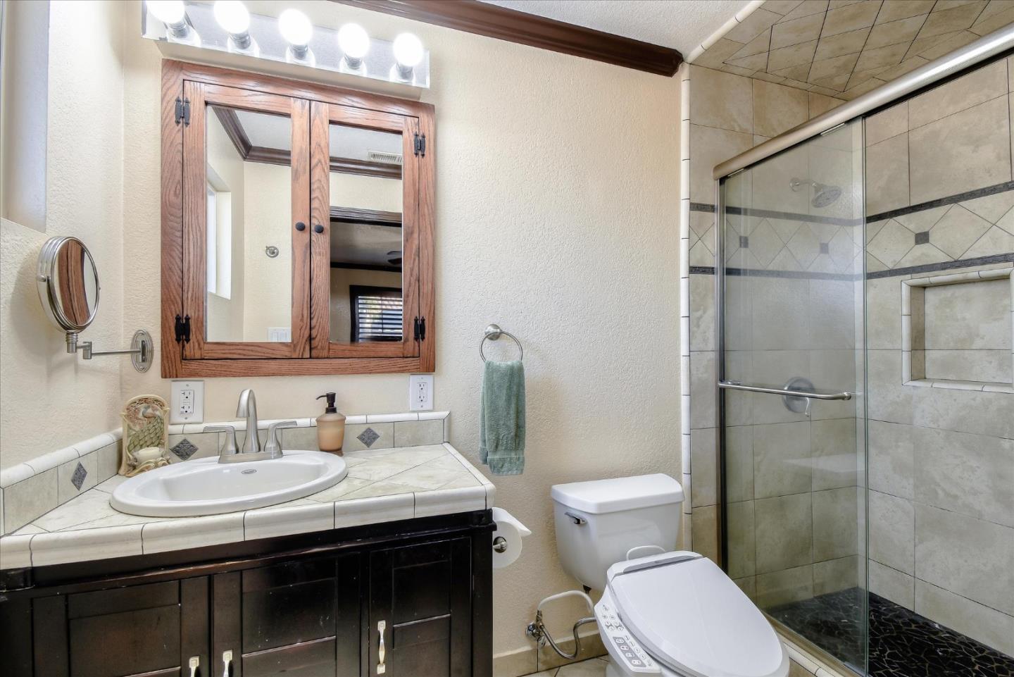 2055 Hogan Drive Santa Clara, CA 95054 - Photo 22 of 37 a bathroom with a sink toilet and shower