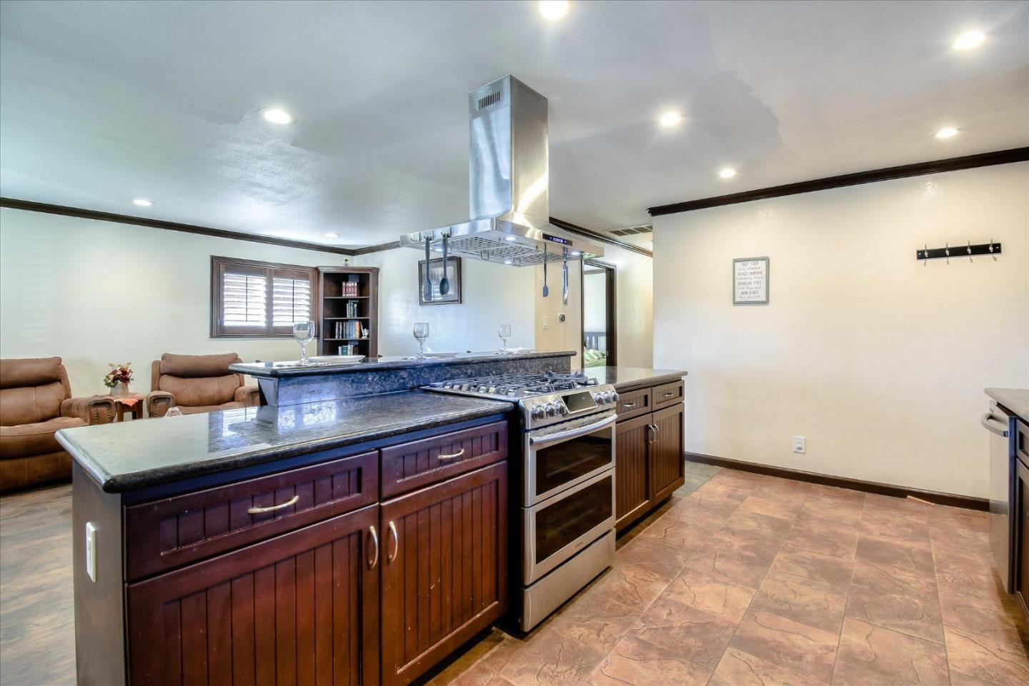 2055 Hogan Drive Santa Clara, CA 95054 - Photo 5 of 37 a kitchen with stainless steel appliances granite countertop a stove and a sink