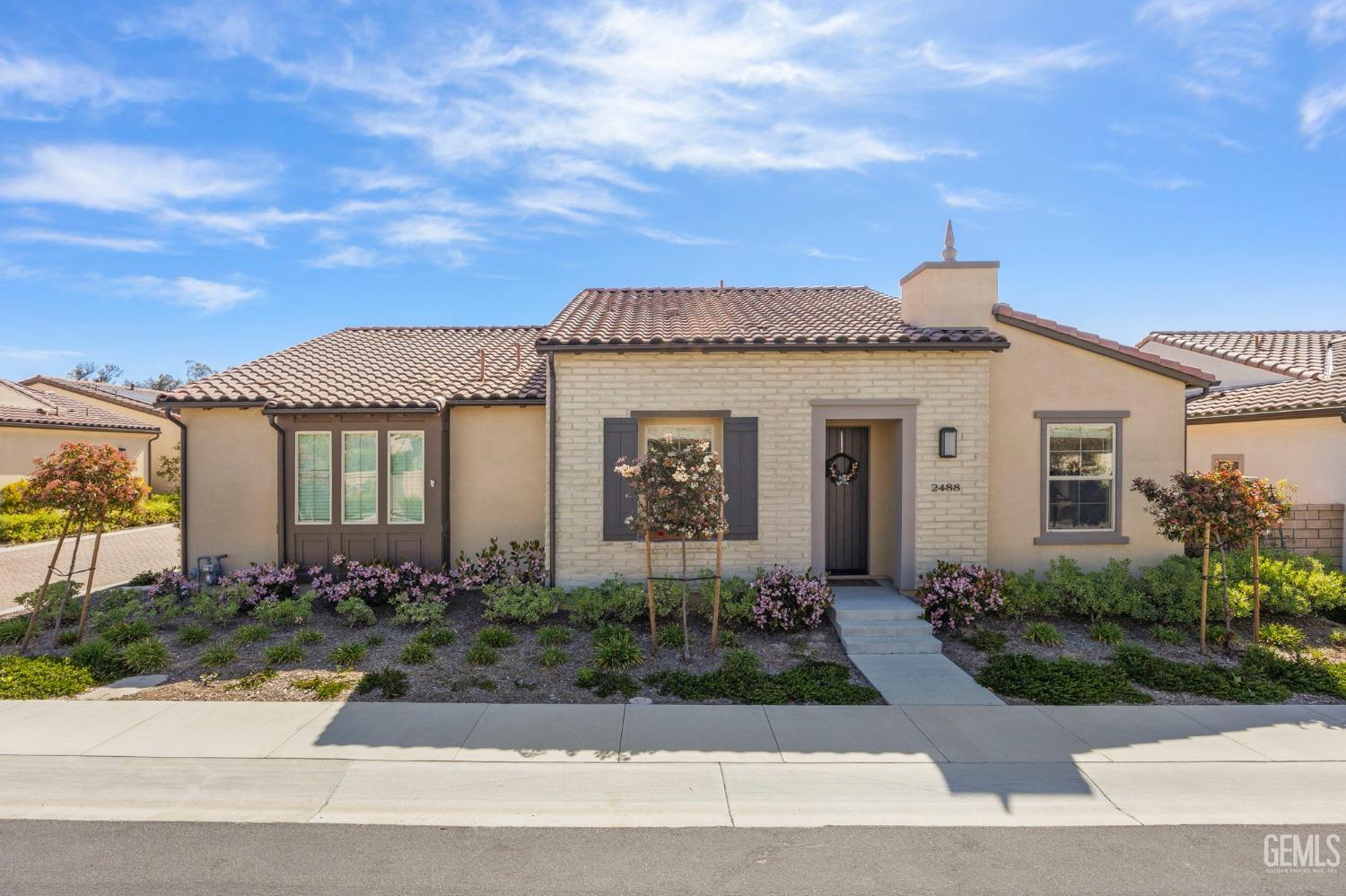 front view of a house with a street