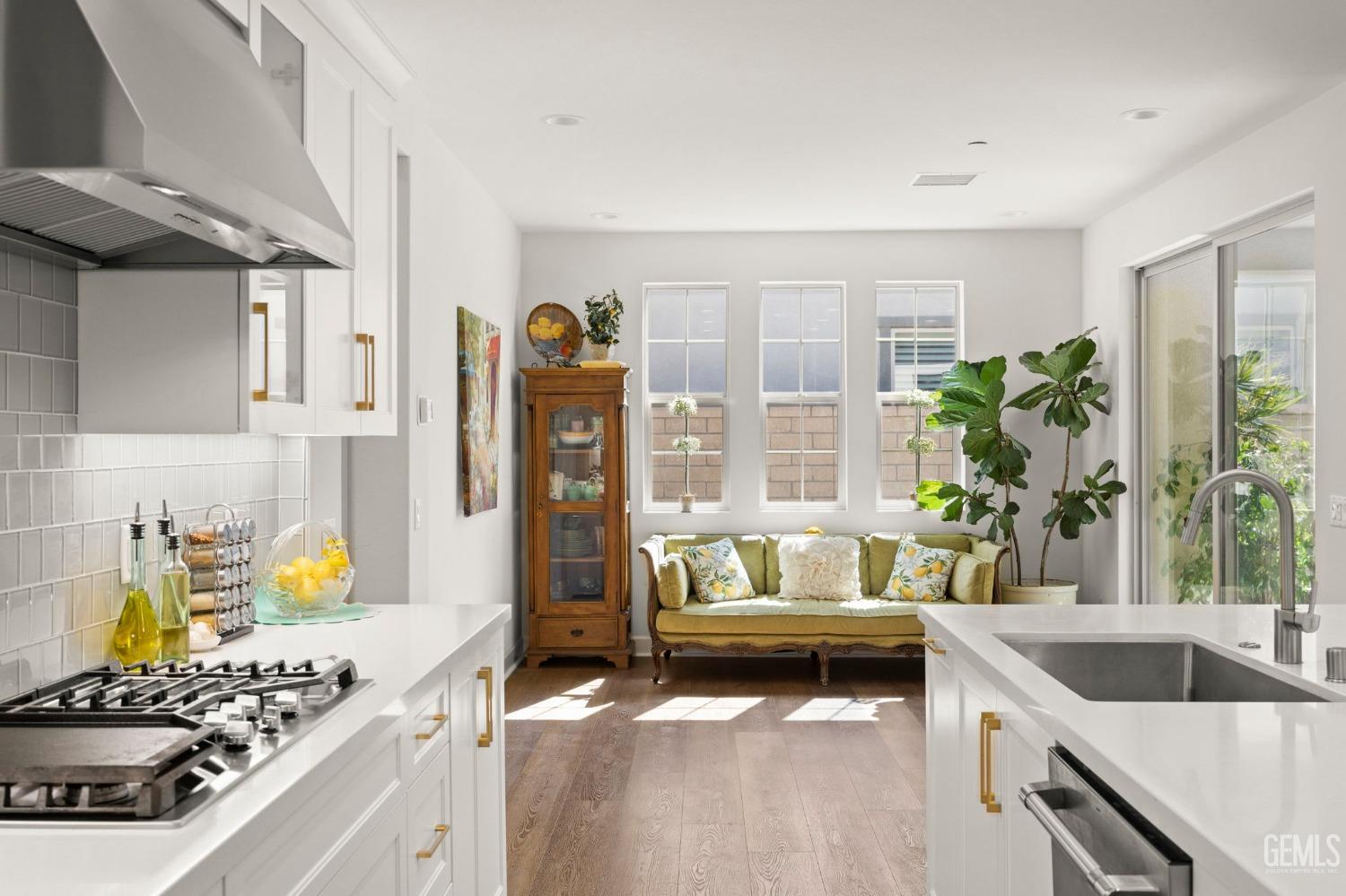 Undisclosed Address Camarillo, CA 93012 - Photo 14 of 54 a kitchen with a stove and a white cabinets