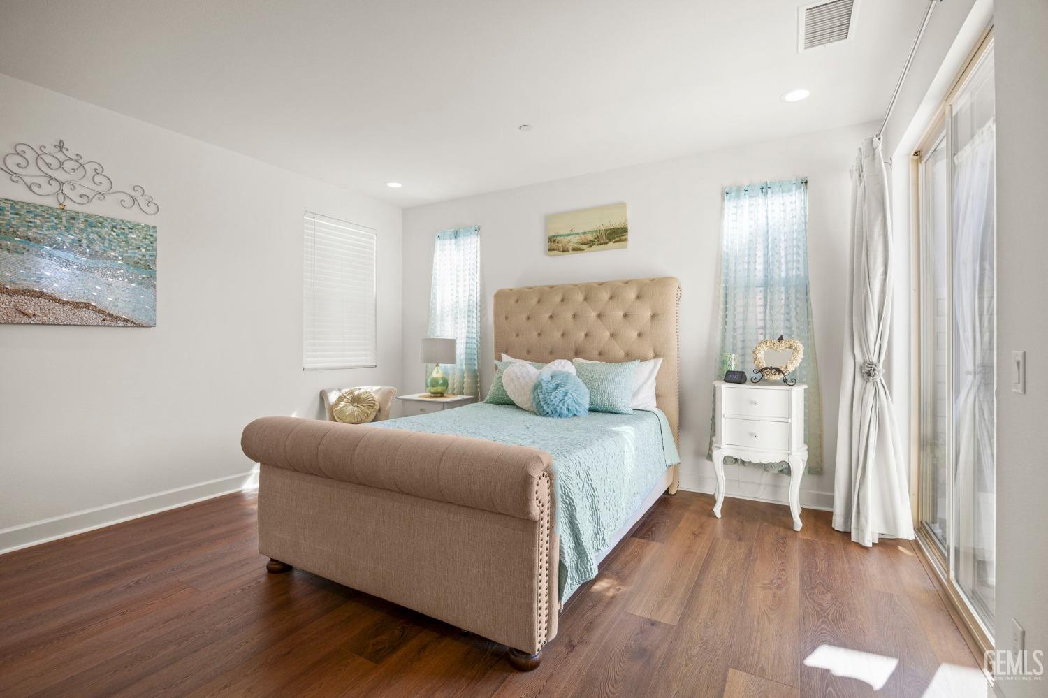 Undisclosed Address Camarillo, CA 93012 - Photo 19 of 54 a bedroom with bed and a night stand