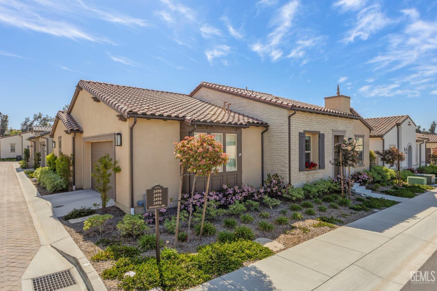 Undisclosed Address Camarillo, CA 93012 - Photo 2 of 54 a front view of a house with garden