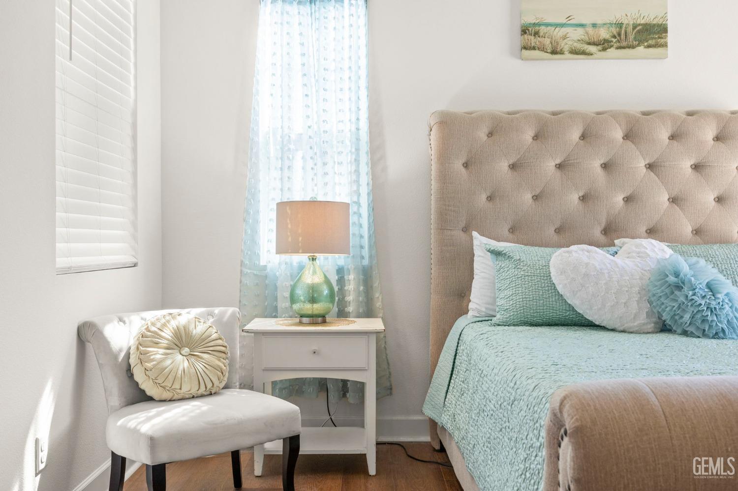 Undisclosed Address Camarillo, CA 93012 - Photo 22 of 54 a bedroom with a bed and a chair