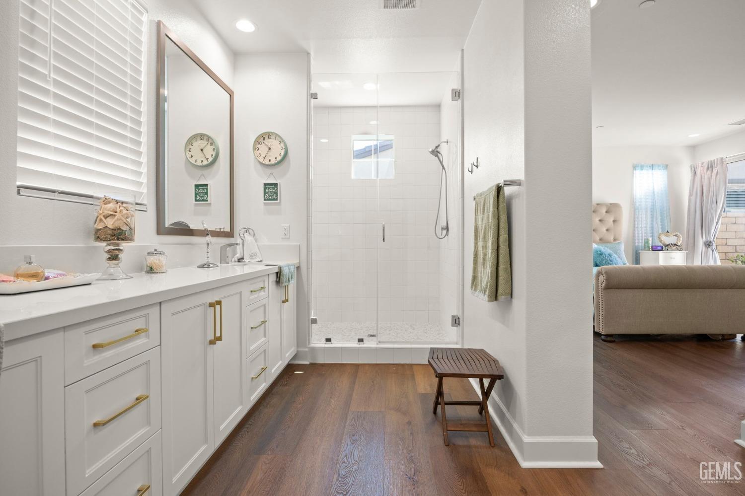 Undisclosed Address Camarillo, CA 93012 - Photo 23 of 54 a spacious bathroom with a double vanity sink a mirror and a bathtub