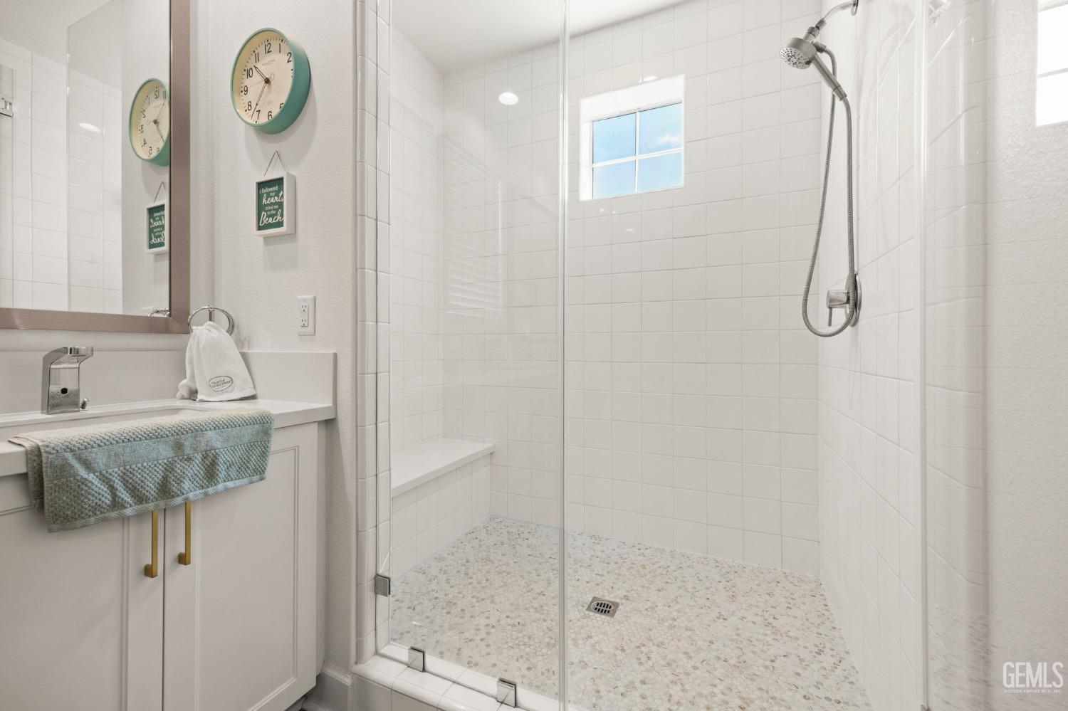 Undisclosed Address Camarillo, CA 93012 - Photo 25 of 54 a bathroom with a granite countertop sink a mirror and shower