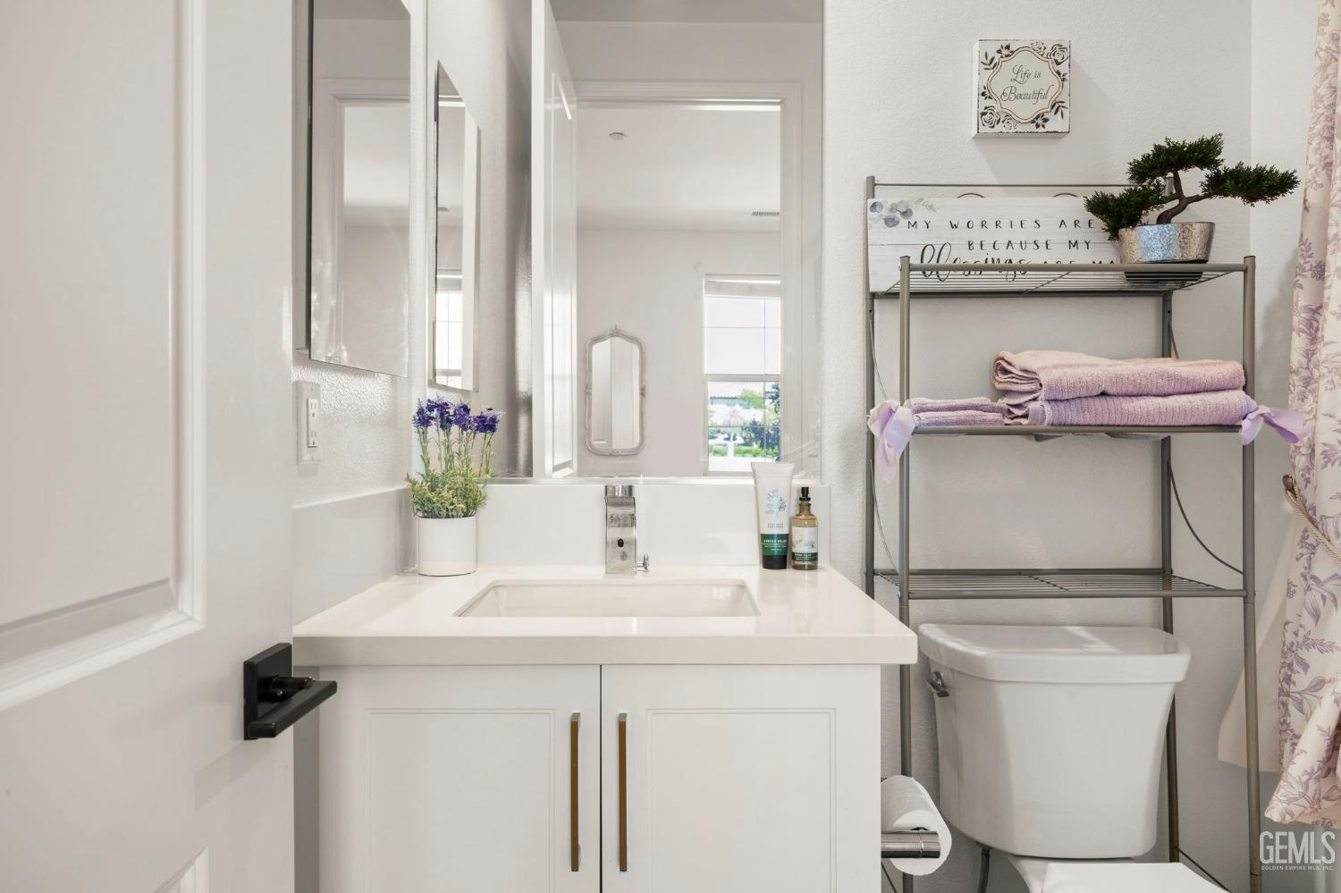 Undisclosed Address Camarillo, CA 93012 - Photo 29 of 54 a bathroom with a sink and a mirror