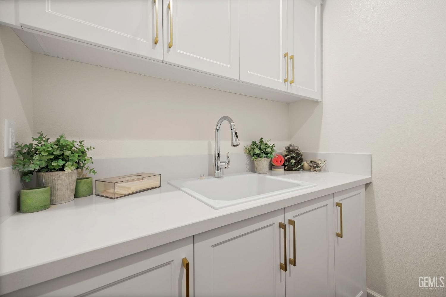 Undisclosed Address Camarillo, CA 93012 - Photo 33 of 54 a kitchen with a sink and cabinets