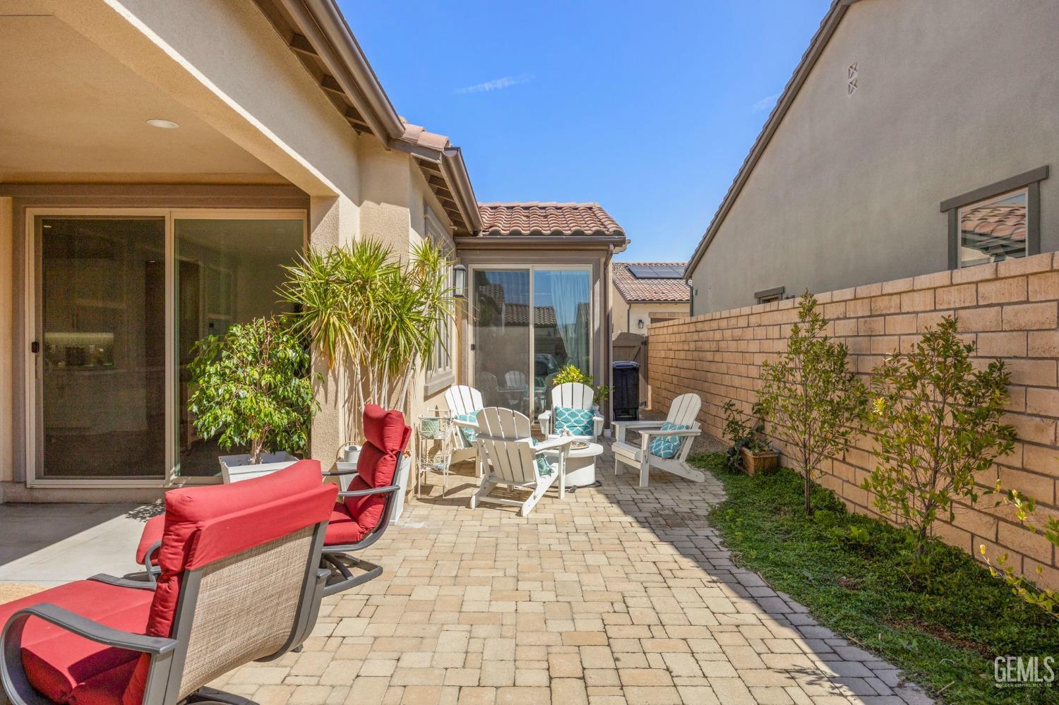 Undisclosed Address Camarillo, CA 93012 - Photo 37 of 54 a backyard of a house with outdoor seating