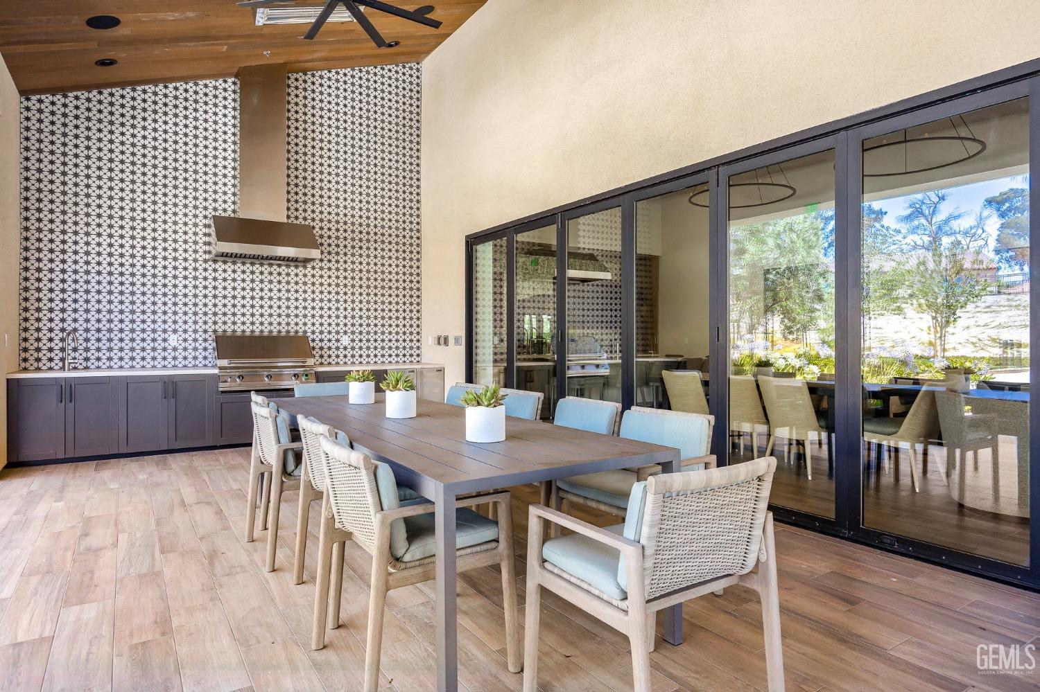 Undisclosed Address Camarillo, CA 93012 - Photo 44 of 54 a view of a dining room with furniture and wooden floor