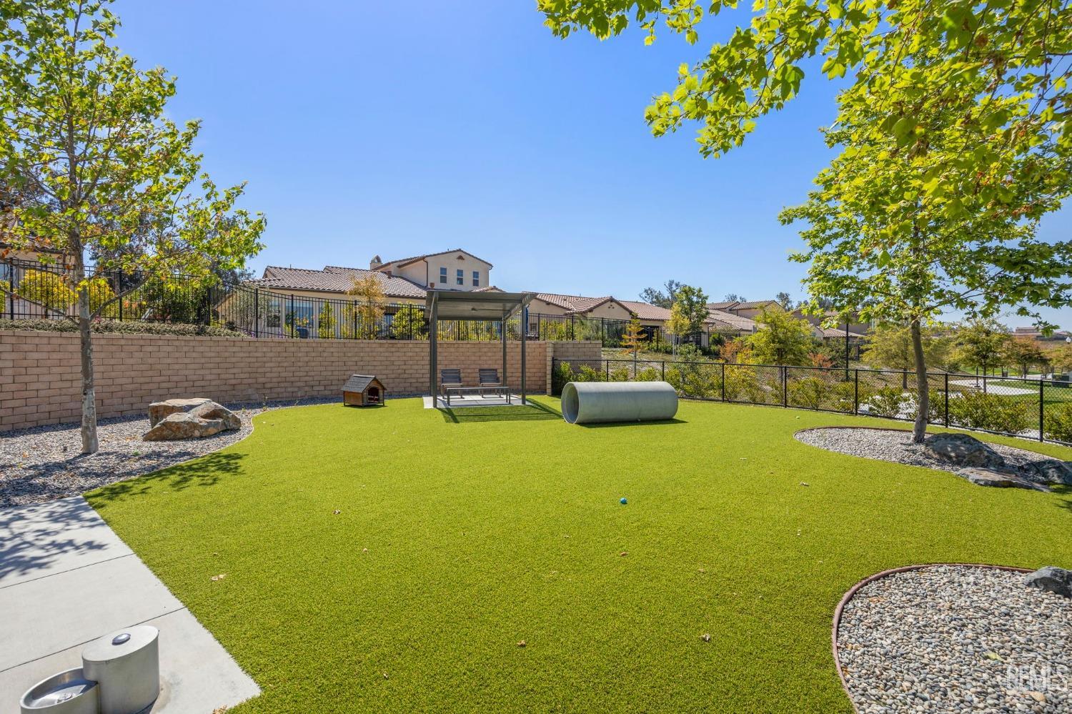 Undisclosed Address Camarillo, CA 93012 - Photo 47 of 54 a view of swimming pool with outdoor seating and house in the background
