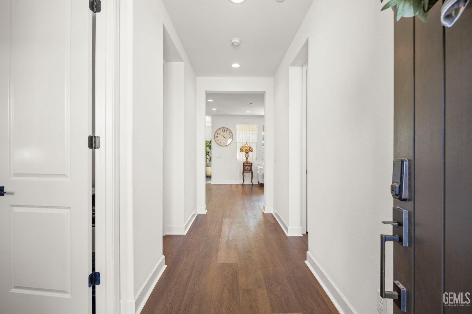 Undisclosed Address Camarillo, CA 93012 - Photo 5 of 54 a view of a hallway with wooden floor