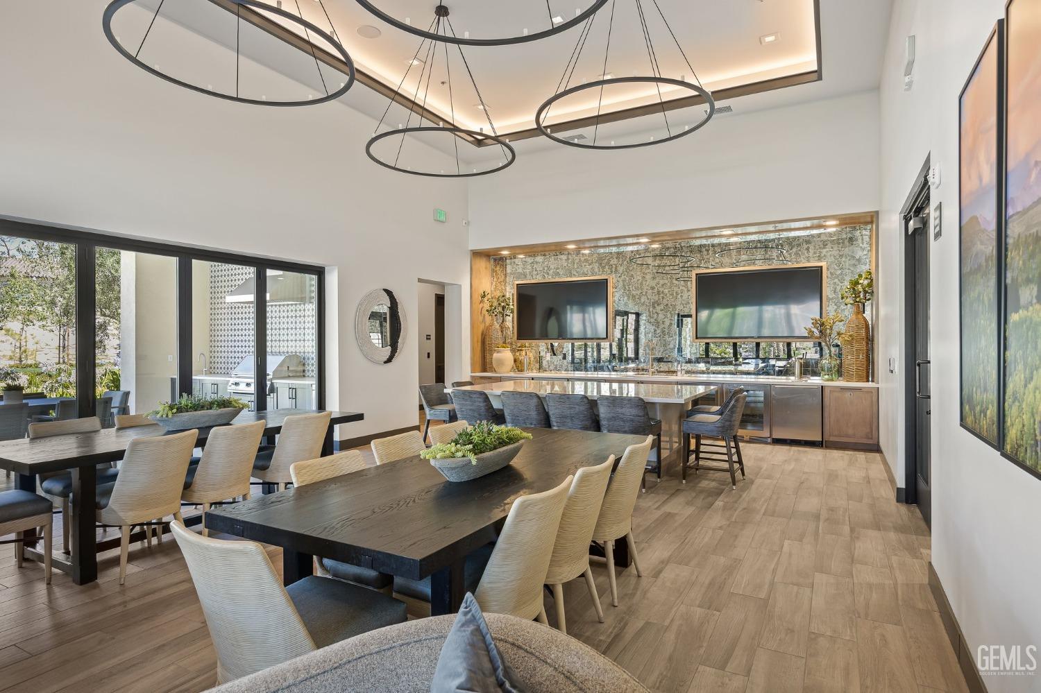 Undisclosed Address Camarillo, CA 93012 - Photo 51 of 54 a view of a dining room with furniture window and wooden floor