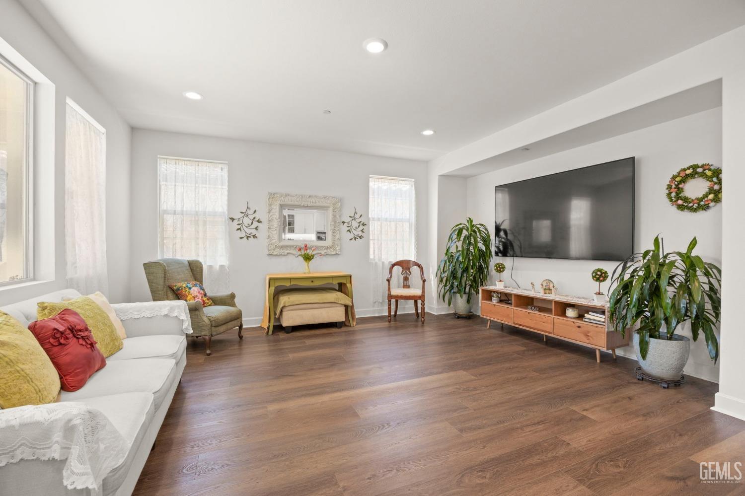 Undisclosed Address Camarillo, CA 93012 - Photo 7 of 54 a living room with furniture and a flat screen tv