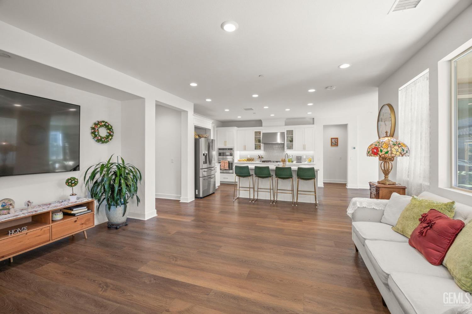 Undisclosed Address Camarillo, CA 93012 - Photo 10 of 54 a living room with furniture and a table with wooden floor
