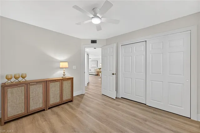 a view of a kitchen with closet area
