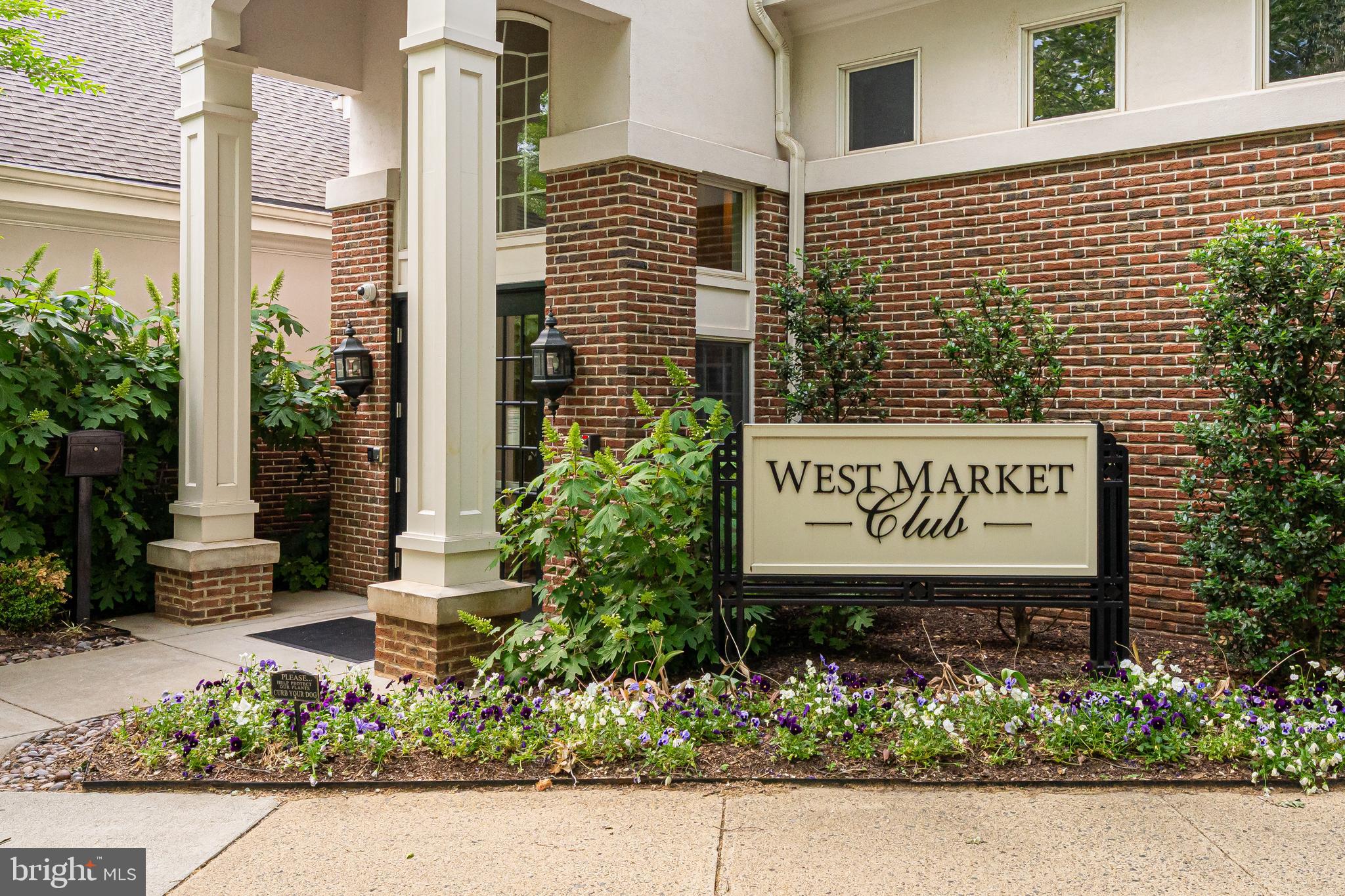 1925 Logan Manor Drive Reston, VA 20190 - Photo 50 of 61 a sign on the side of a building