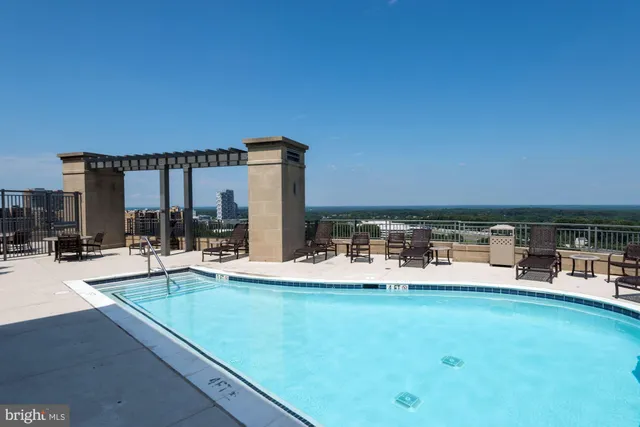 a view of a chairs and table in the patio