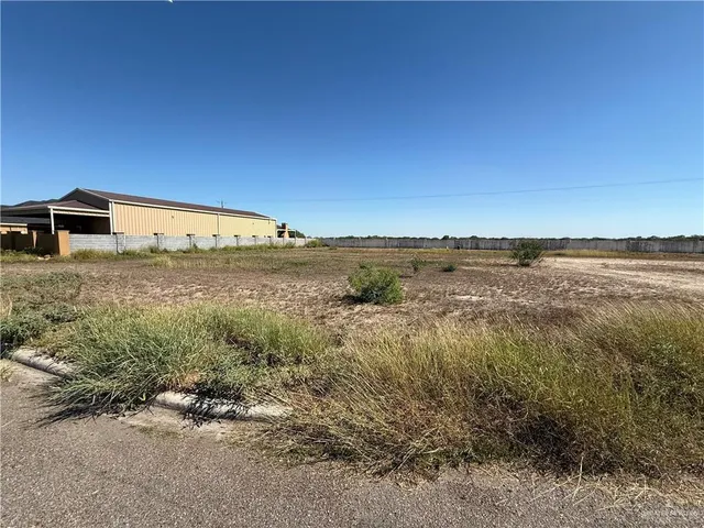 a view of a big yard next to a large building
