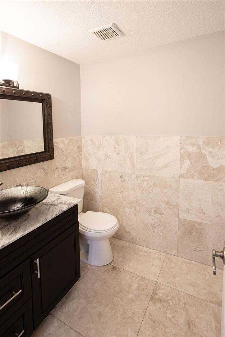 Undisclosed Address Pompano Beach, FL 33073 - Photo 11 of 35 half bath 1st floor