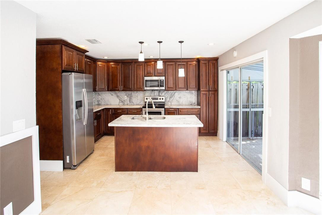 Undisclosed Address Pompano Beach, FL 33073 - Photo 4 of 35 kitchen