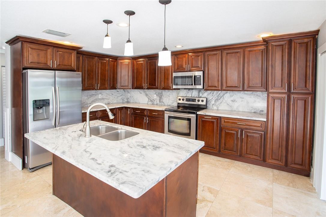 Undisclosed Address Pompano Beach, FL 33073 - Photo 6 of 35 kitchen