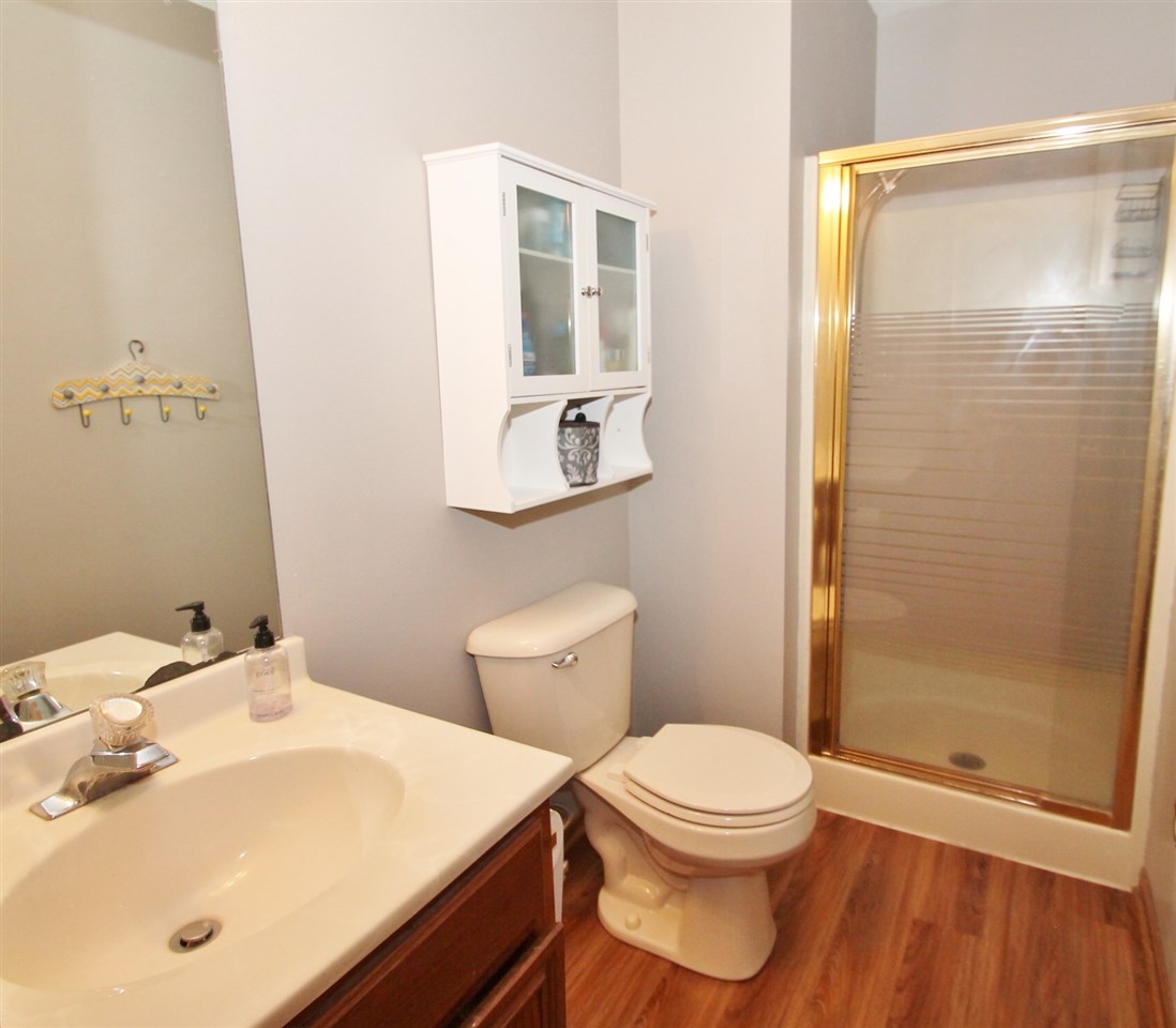 518 Pin Oak Road Rockton, IL 61072 - Photo 17 of 25 a bathroom with a sink a toilet and shower