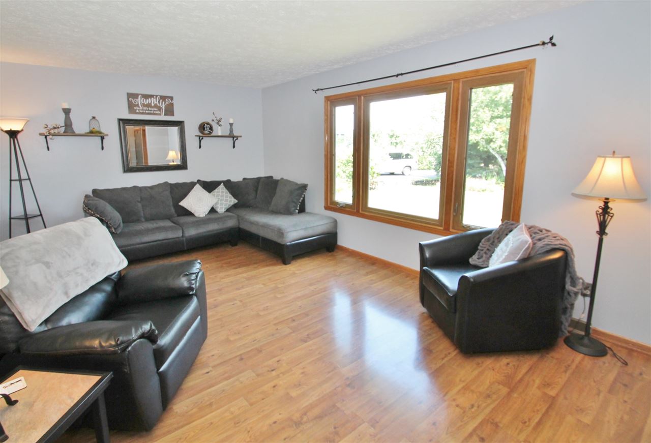 518 Pin Oak Road Rockton, IL 61072 - Photo 9 of 25 a living room with furniture and a large window
