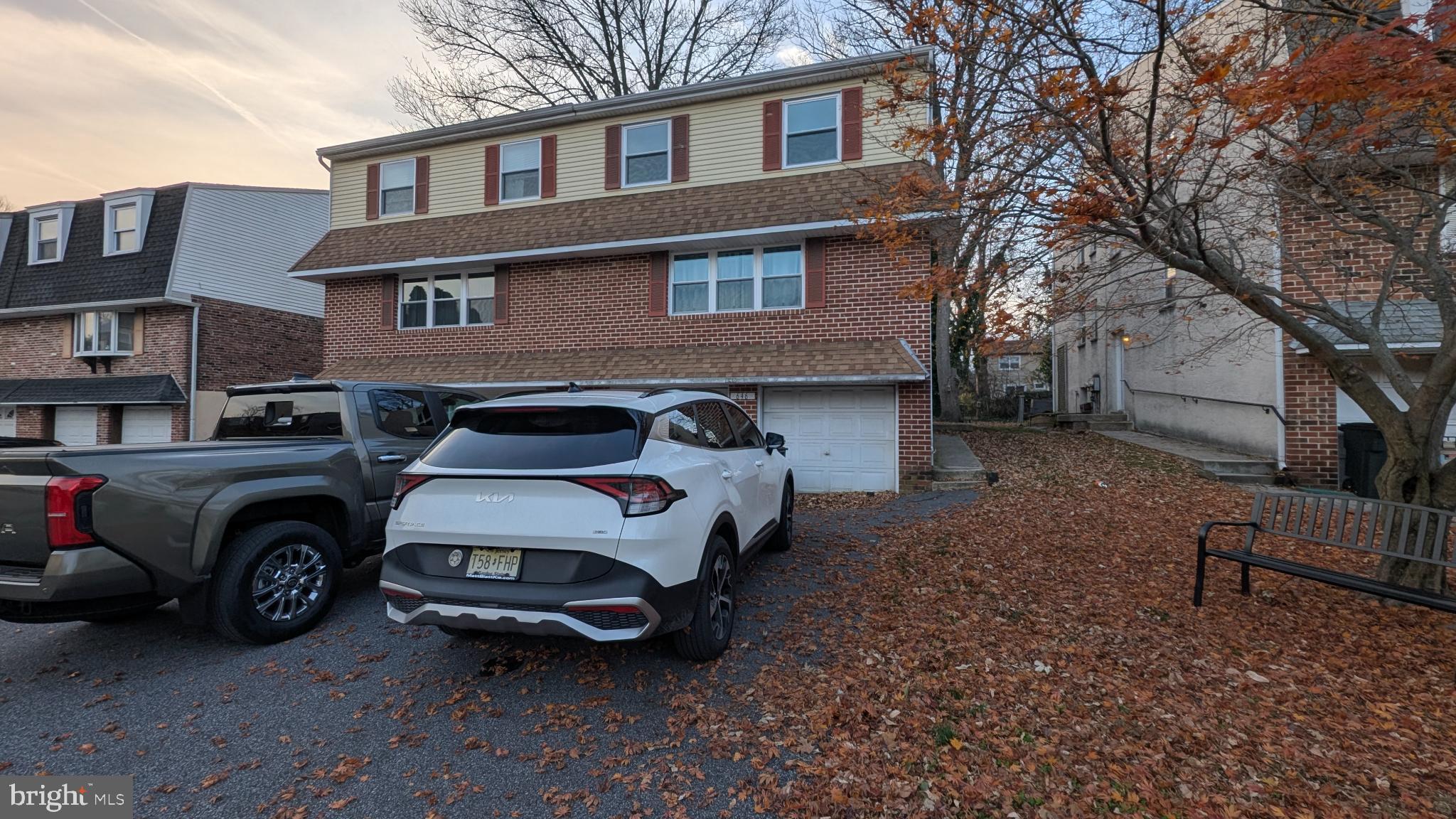 a car parked in front of a house