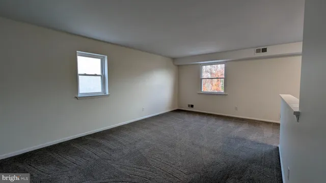 a view of a window in an empty room