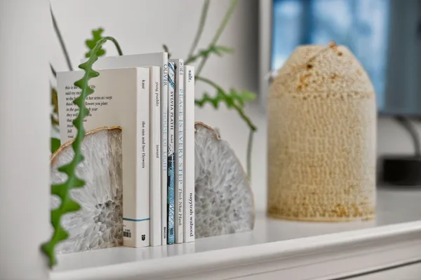 a view of living room with furniture and fireplace