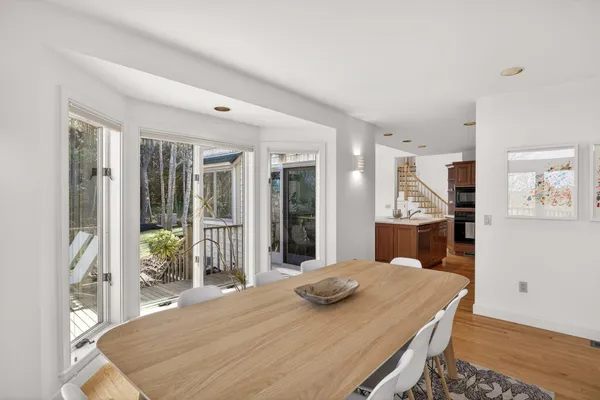 a bedroom with a large bed and a large window