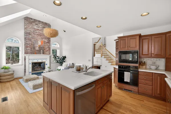 a view of a balcony with trees