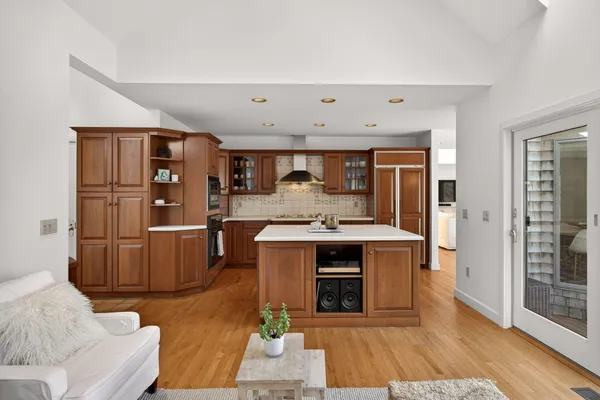 a view of entryway with wooden floor and stairs