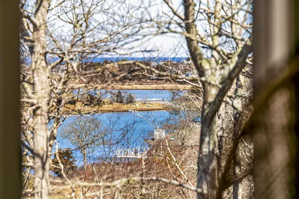 a view of a lake in front of the house