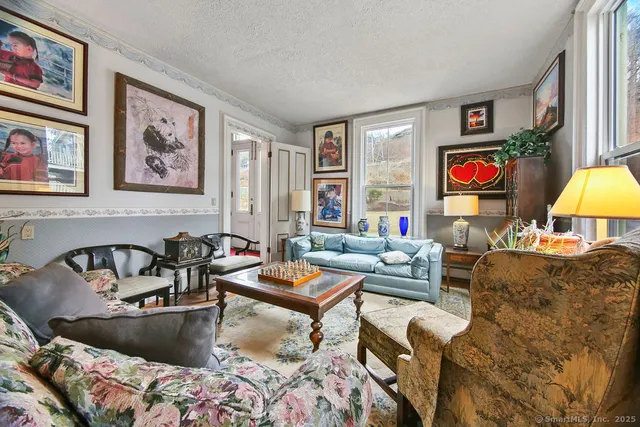 a living room with furniture and a couch