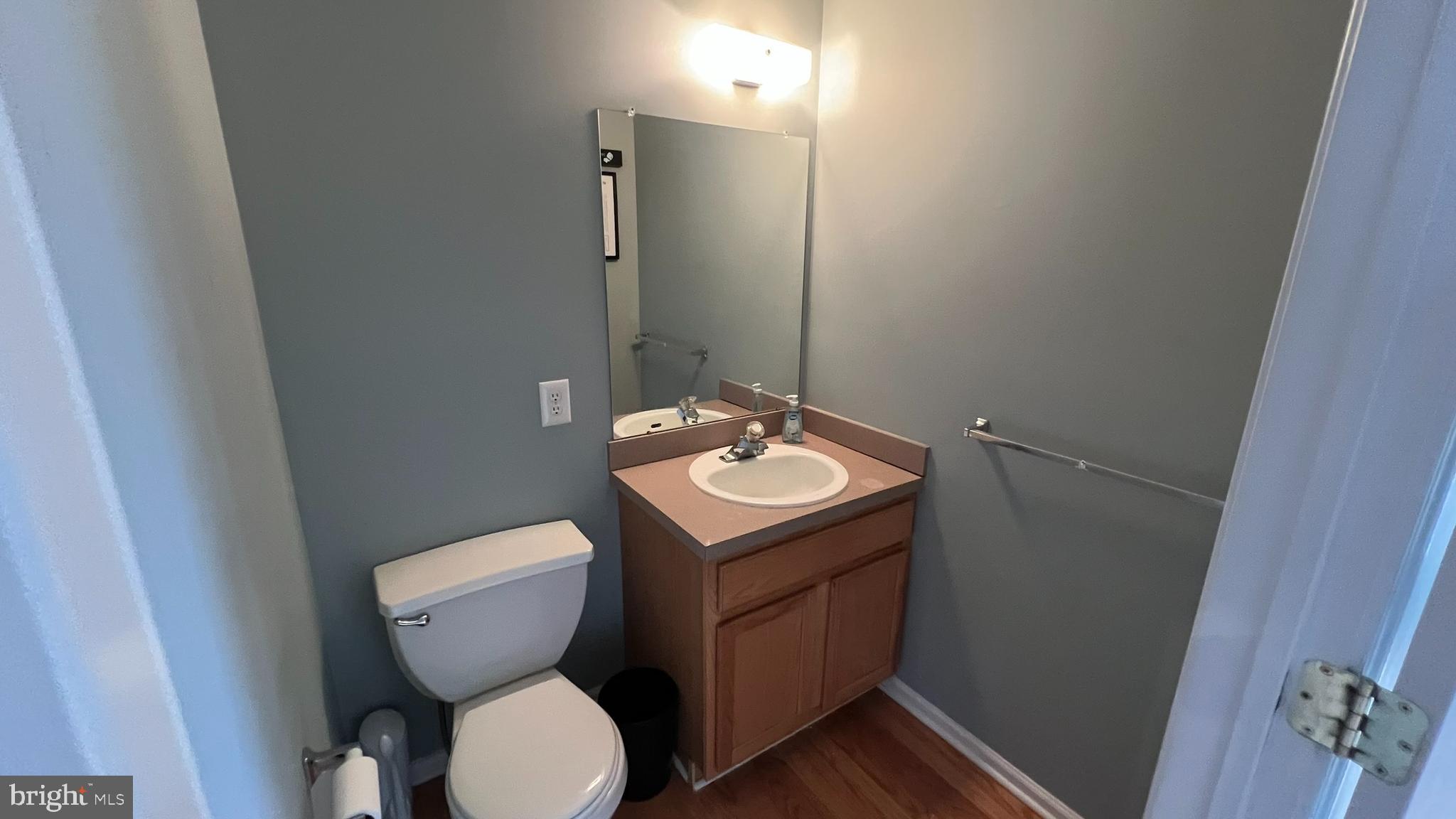 415 Stockton Loop Williamstown, NJ 08094 - Photo 18 of 41 a bathroom with a toilet sink and mirror