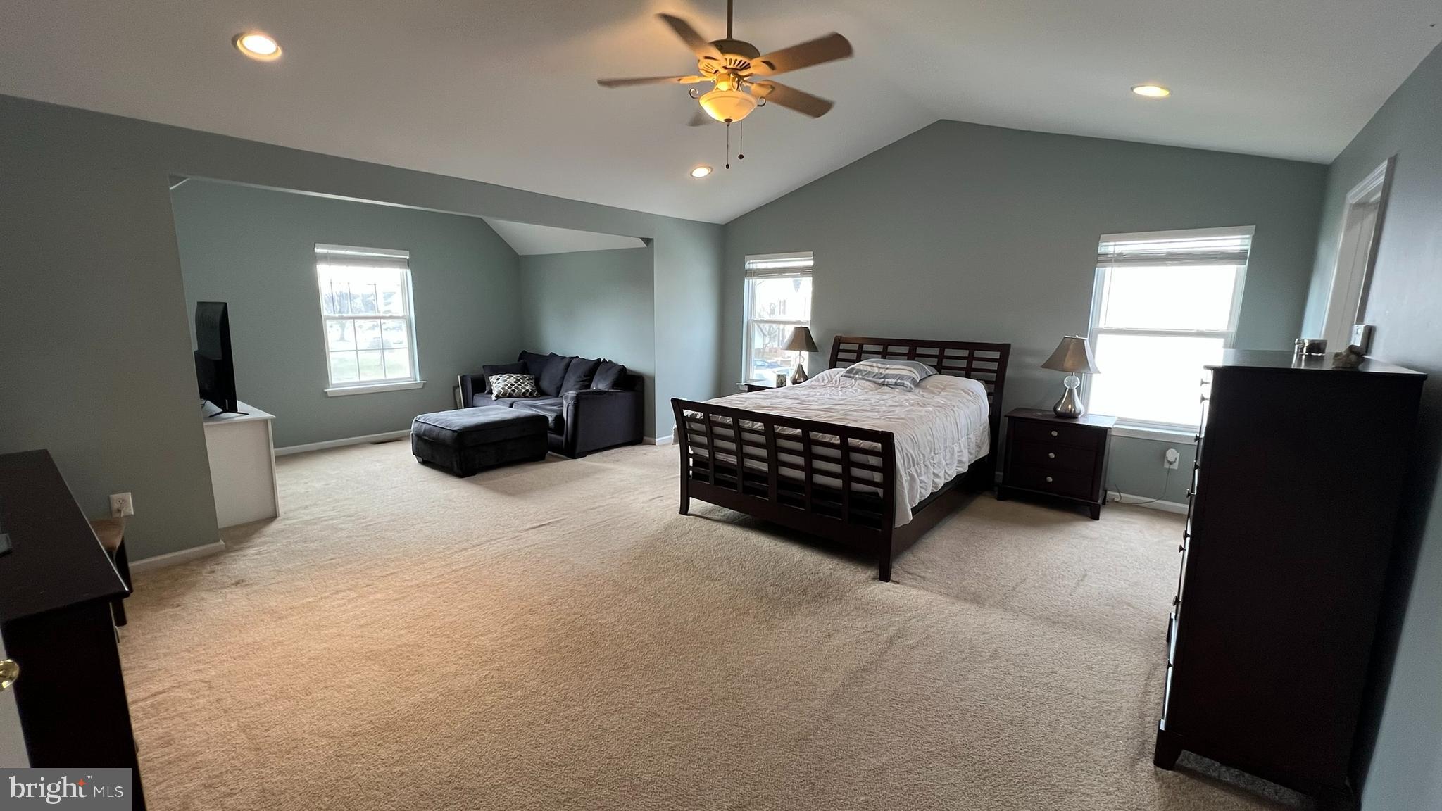 415 Stockton Loop Williamstown, NJ 08094 - Photo 25 of 41 a living room with furniture and a flat screen tv