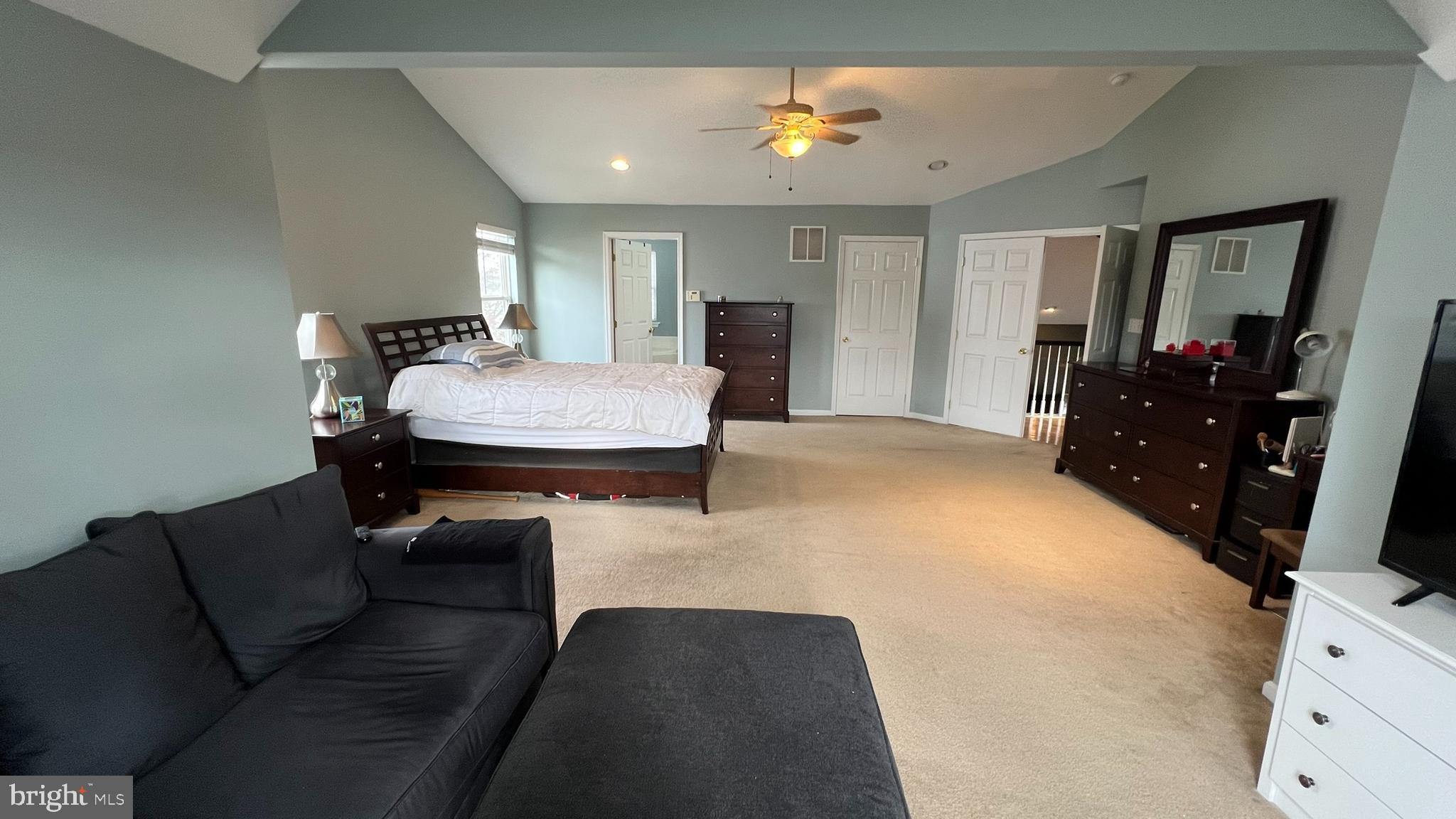 415 Stockton Loop Williamstown, NJ 08094 - Photo 29 of 41 a living room with furniture and a flat screen tv