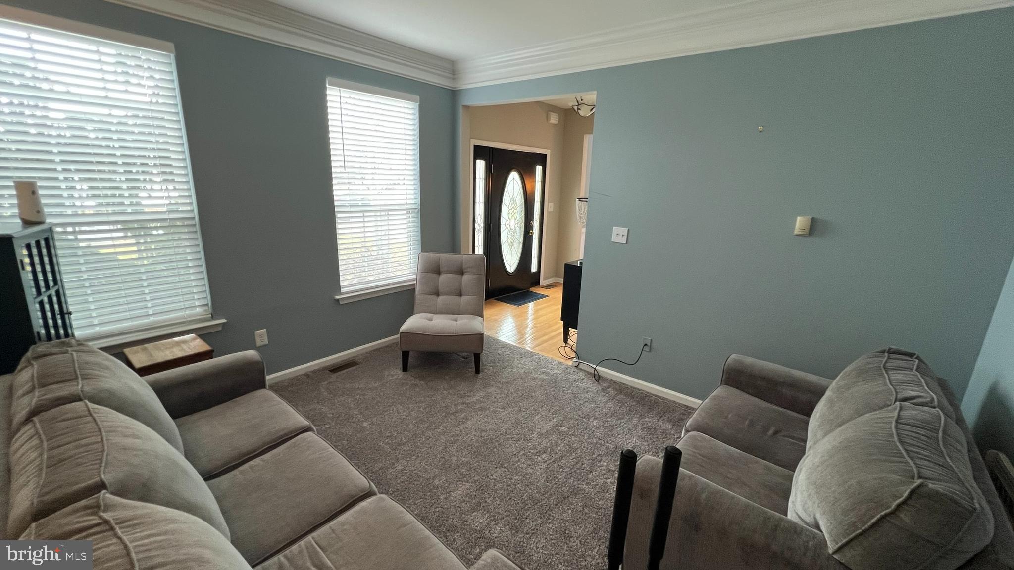 415 Stockton Loop Williamstown, NJ 08094 - Photo 3 of 41 a living room with furniture and a window