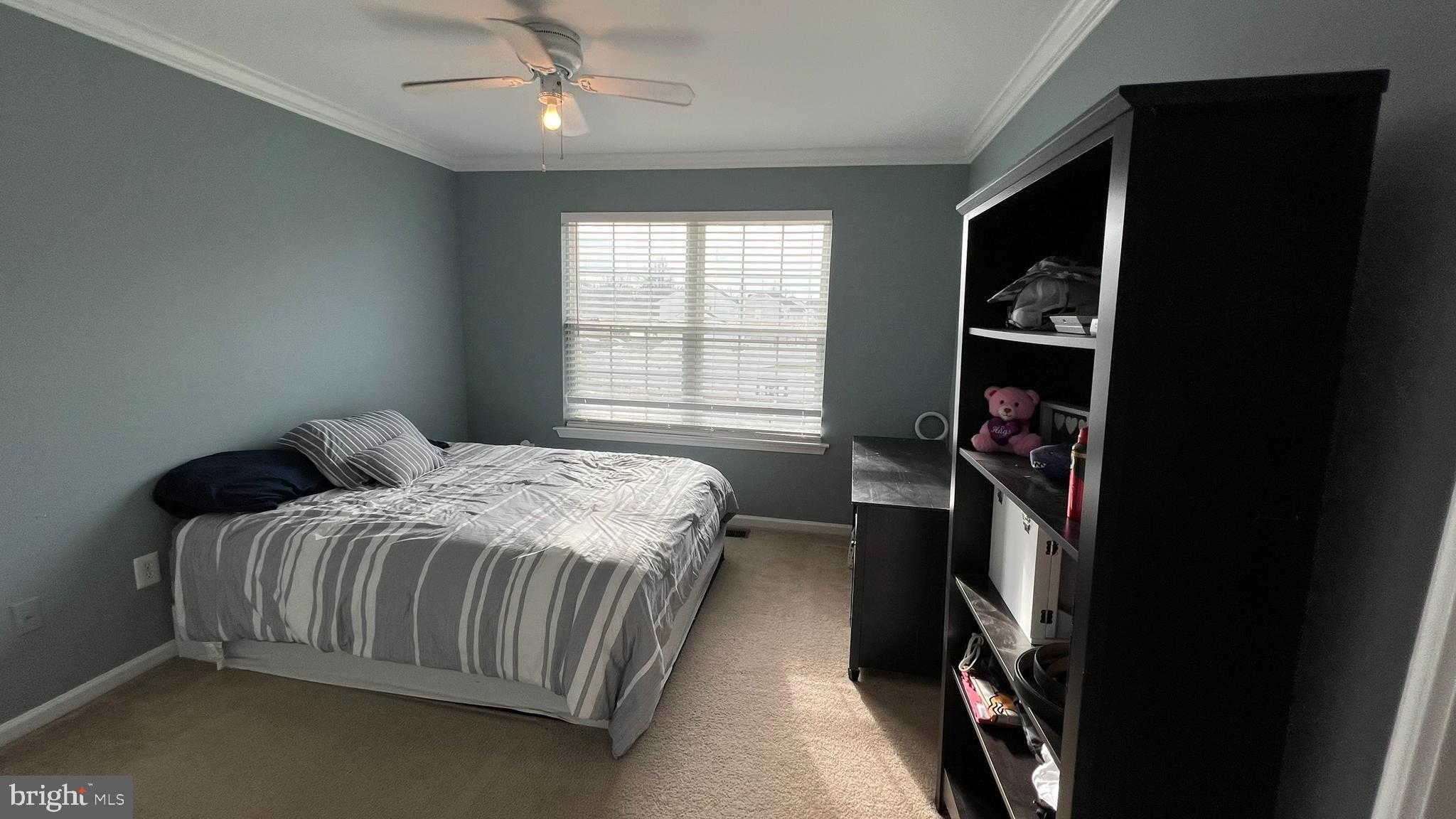 415 Stockton Loop Williamstown, NJ 08094 - Photo 34 of 41 a bedroom with a bed and a window