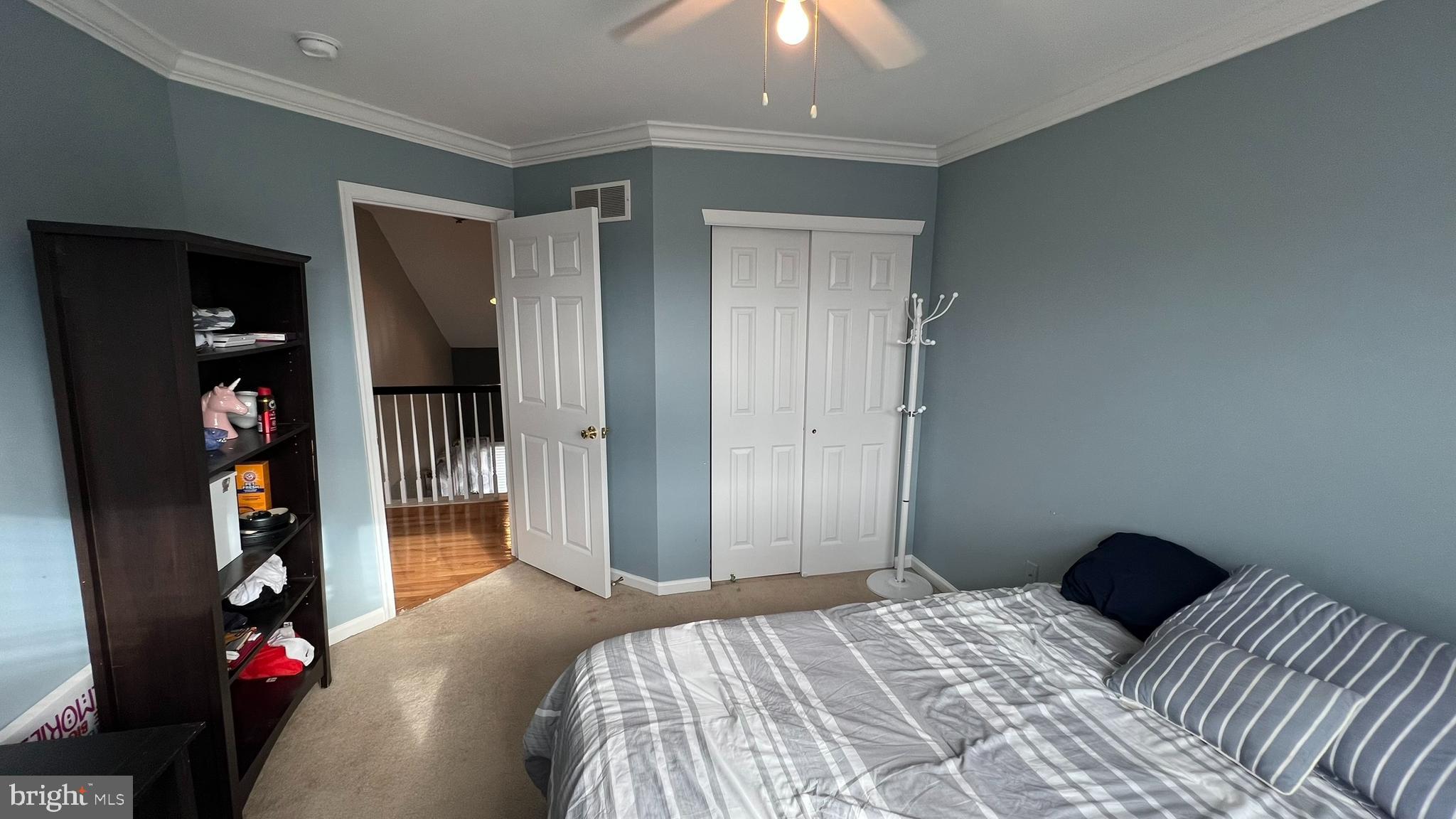 415 Stockton Loop Williamstown, NJ 08094 - Photo 35 of 41 a bedroom with a bed and a closet