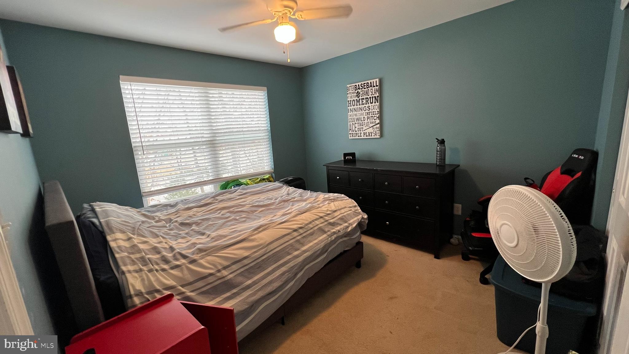 415 Stockton Loop Williamstown, NJ 08094 - Photo 37 of 41 a bed sitting in a bedroom next to a window