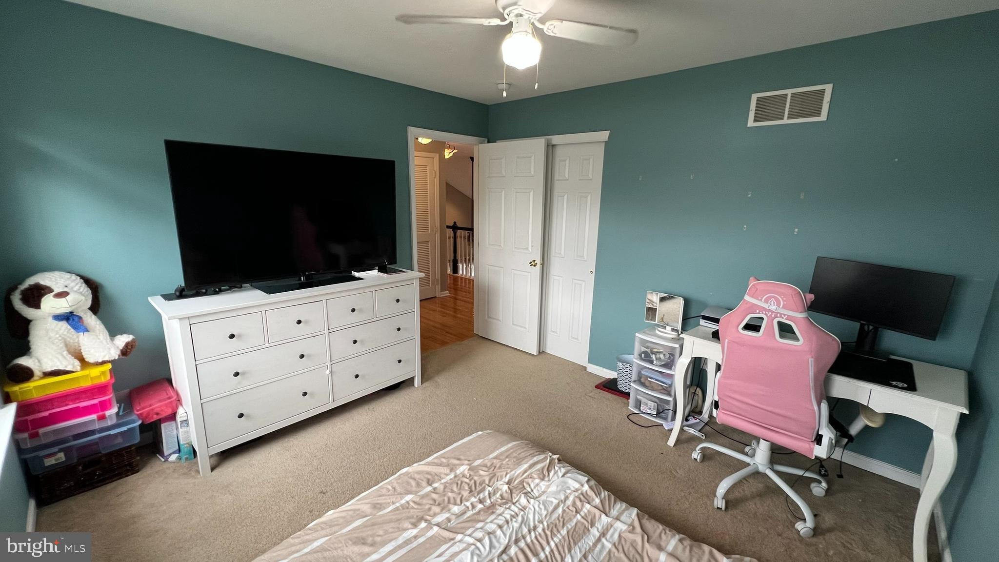 415 Stockton Loop Williamstown, NJ 08094 - Photo 40 of 41 a room with furniture and flat screen tv