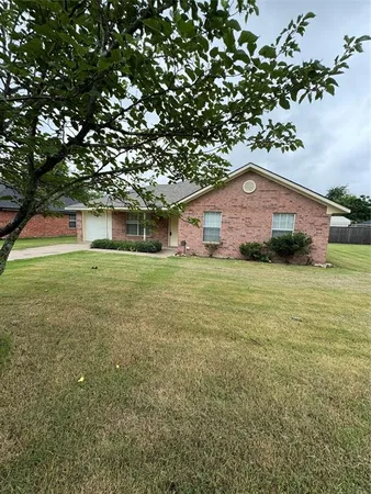 a front view of house with yard