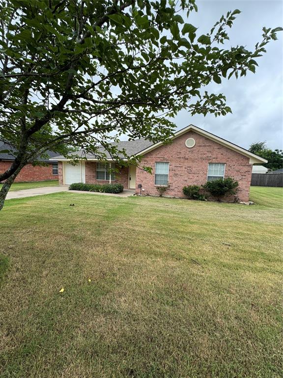 a front view of house with yard
