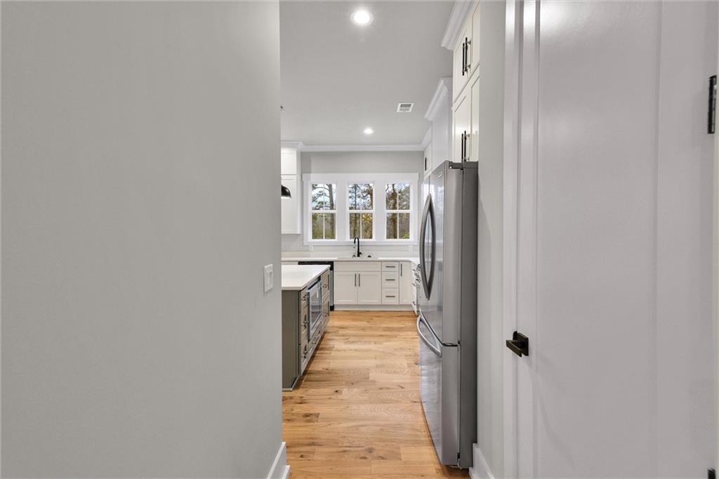 3369 Dodson Drive Connector East Point, GA 30344 - Photo 14 of 43 a view of a hallway with wooden floor