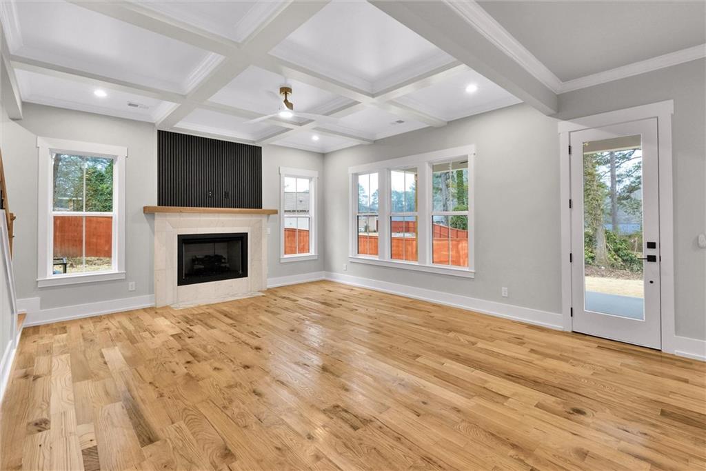 3369 Dodson Drive Connector East Point, GA 30344 - Photo 17 of 43 a view of empty room with a fireplace and windows